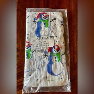 Vintage NIP Sealed Snowman Tissue Tablecover 1996
Made in USA. See pkg. for size